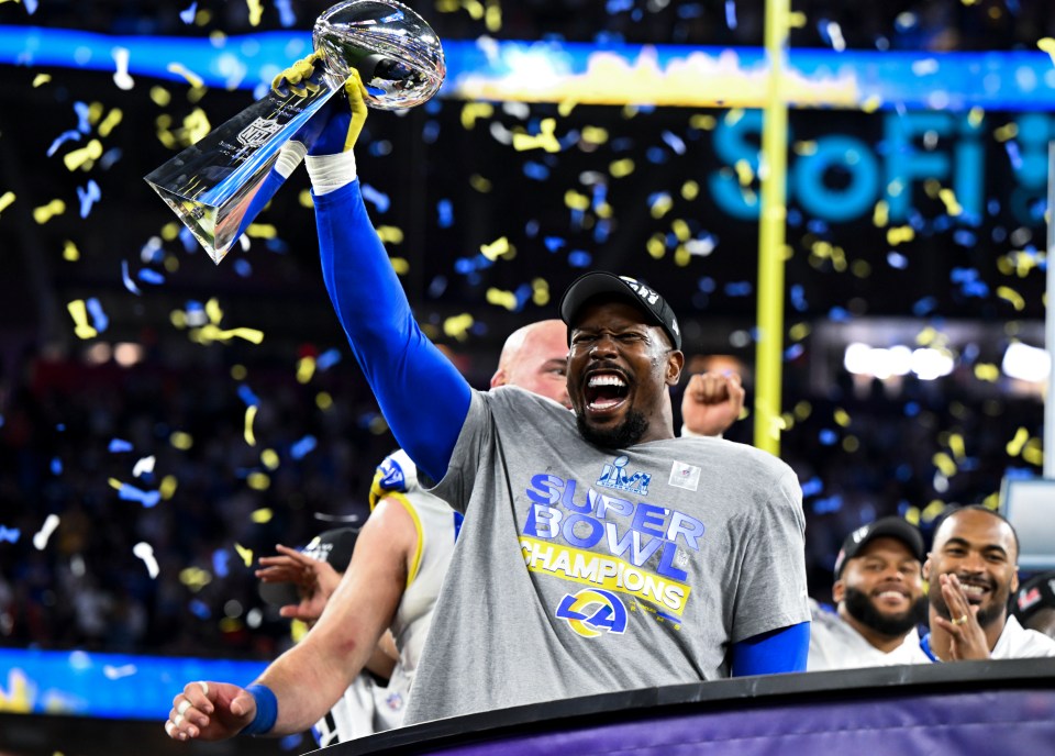 Los Angeles Rams outside linebacker Von Miller (40) holds onto the Lombardi Trophy