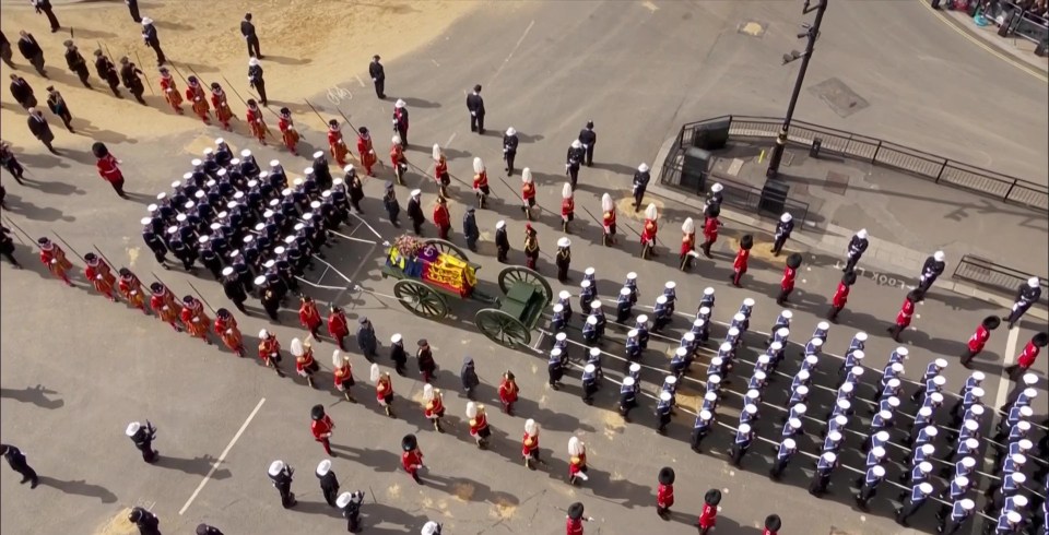 An aerial view of the sombre procession