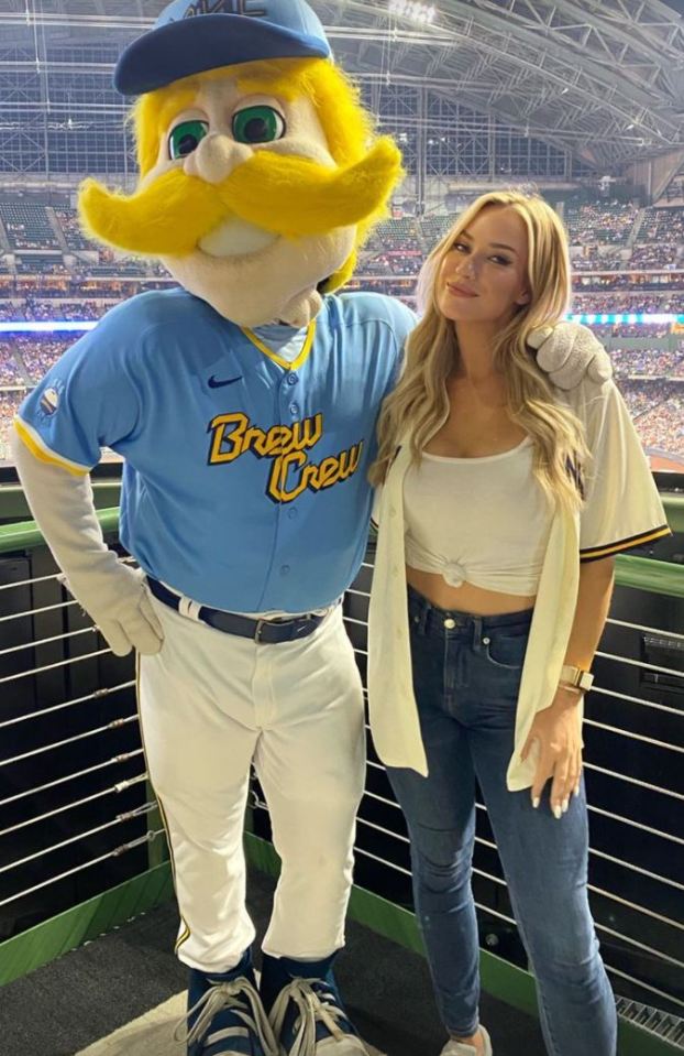 The 29-year-old poses with Bernie Brewer