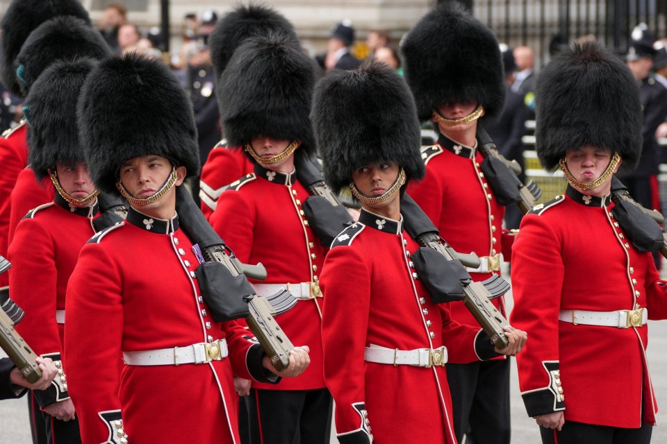 The Queen's Company of The Grenadier Guards traditionally provides the pallbearers for all deceased monarchs