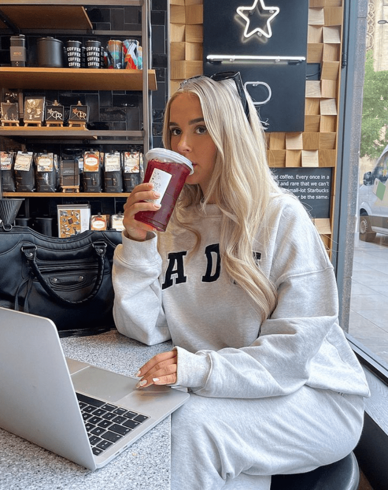 Molly Mae posed in a coffee shop today