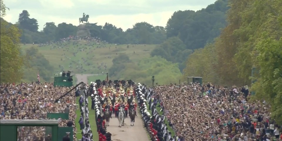 Thousands of mourners have lined The Long Walk to the castle