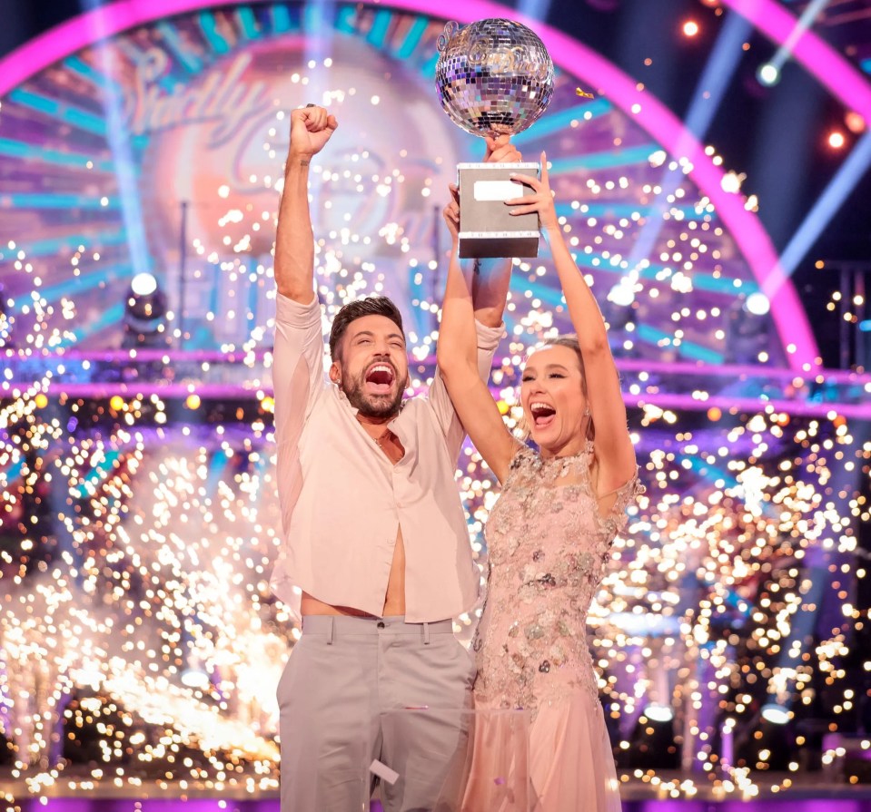 Rose and Giovanni celebrate with the glitterball trophy after winning last year's Strictly