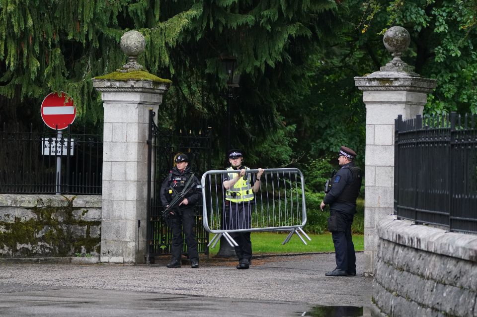 Barriers are moved into place at the entrance to Balmoral