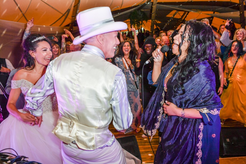 Happy Mondays’ Rowetta sings for the newly weds at the wedding party