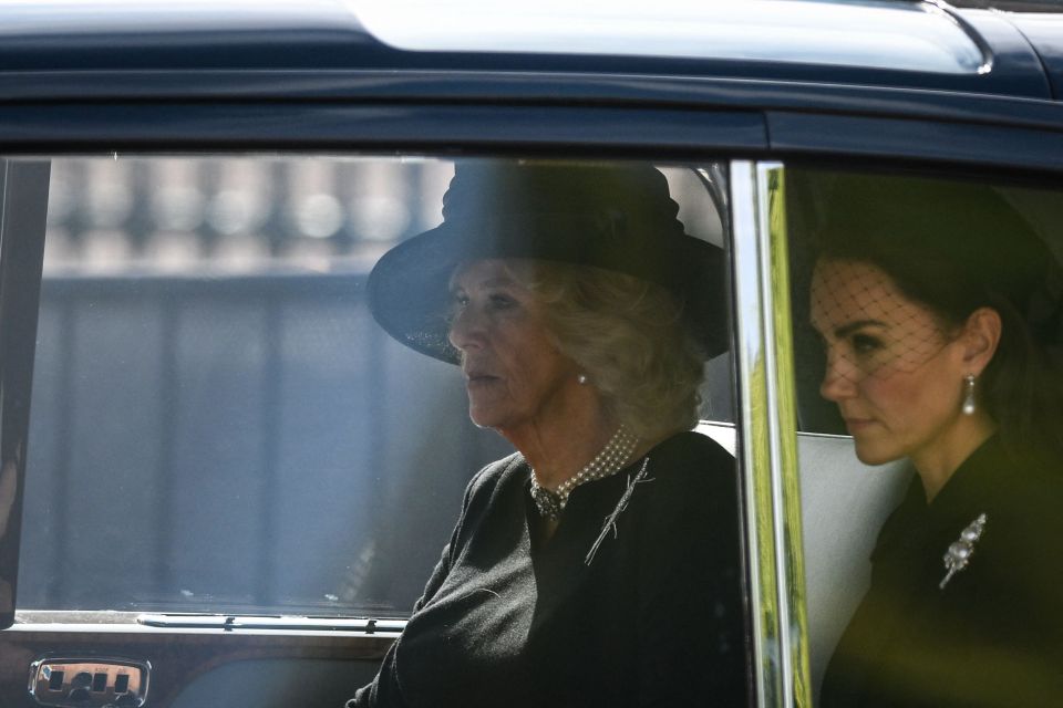 Kate Middleton and Camilla followed behind the procession in a car