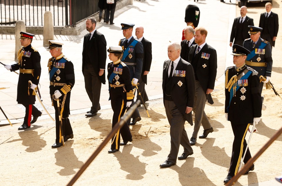 The royals moments before saluting the coffin