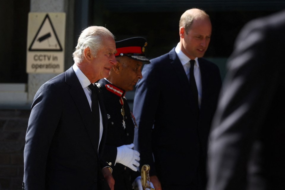 The father and son visiting the Metropolitan Police Headquarters earlier today