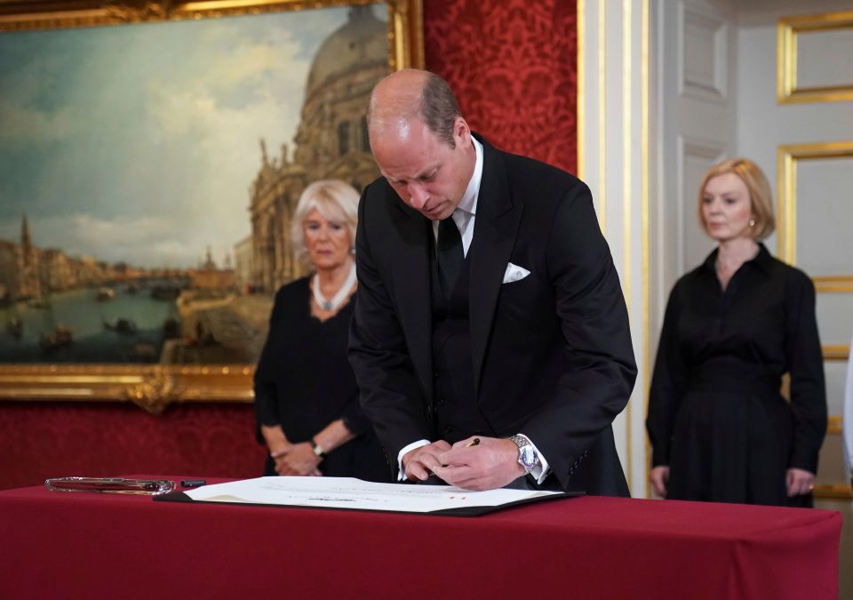 William signs the proclamation