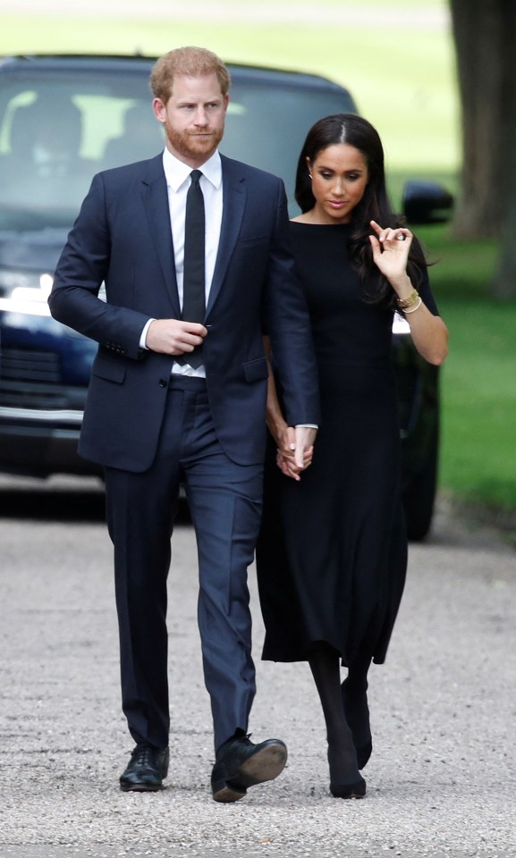 The duke, pictured with Meghan meeting mourners at Windsor, will have to wear a suit