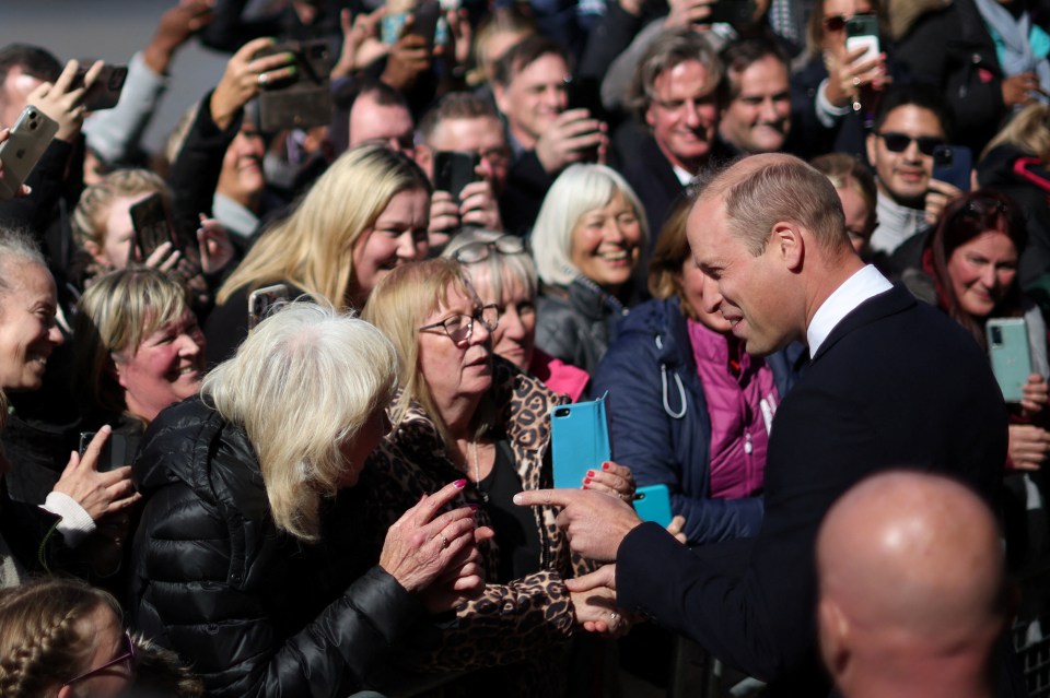 The crowd beamed back at the Prince of Wales