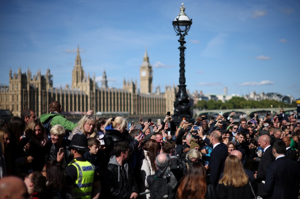 A sea of phones taking pictures of the surprise visit