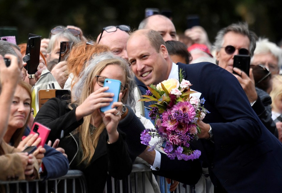 Willis takes a selfie with a member of the public