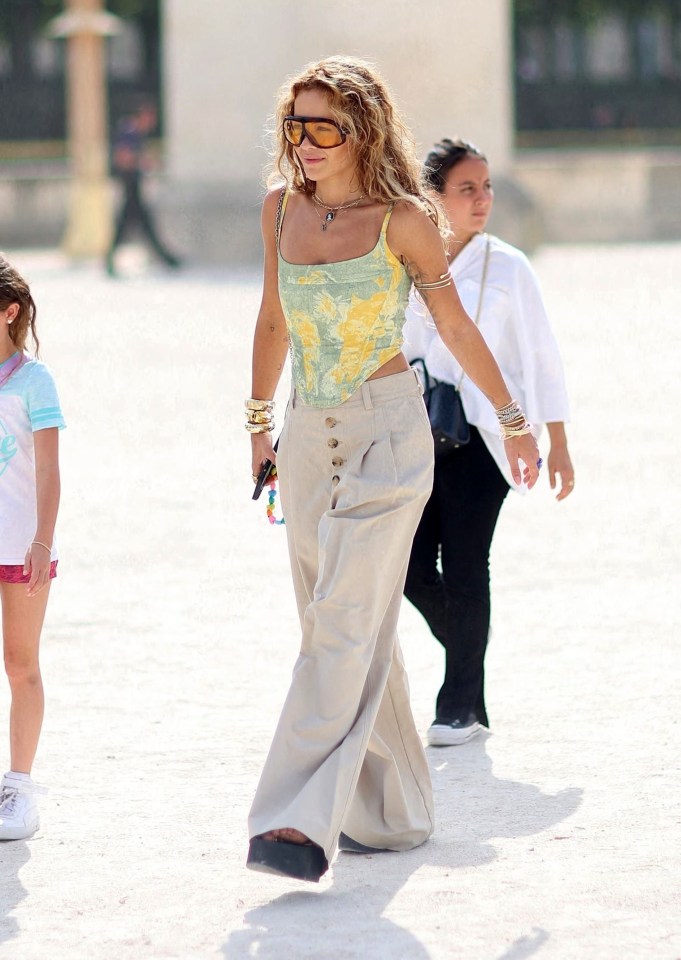 Singer Rita Ora has shown how you can tweak the triangular look with separates when she wore a corset-style top and trousers on a visit to the Louvre in Paris in July