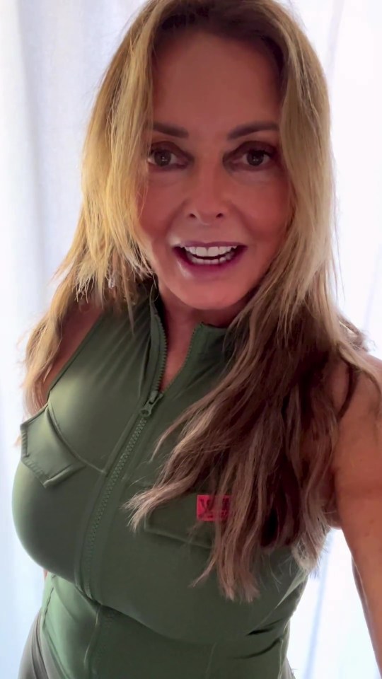 Carol Vorderman showed off her incredible figure in a figure-hugging sports top