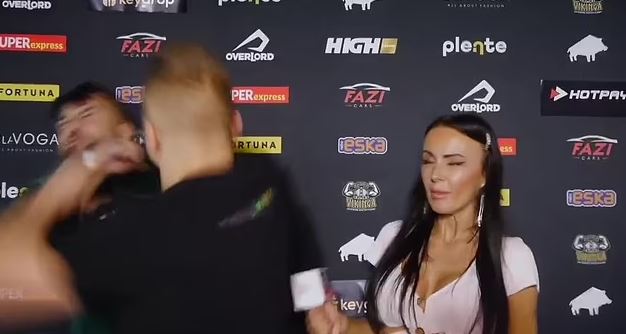 The MMA fighter punched the YouTuber in the face during an interview