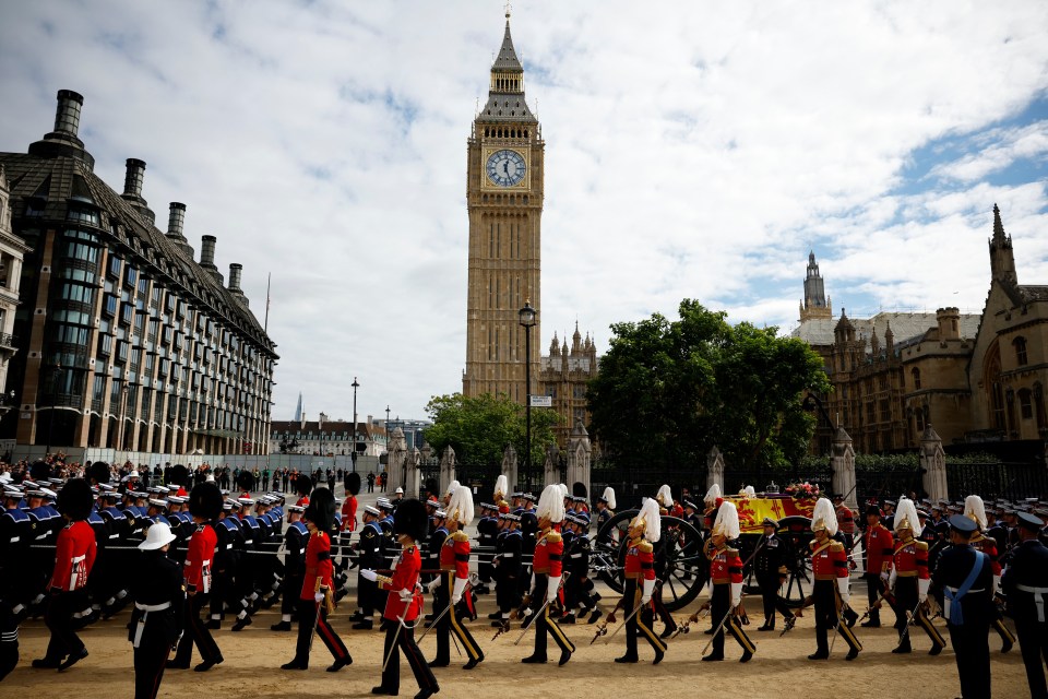 The procession files past London's Big Ben