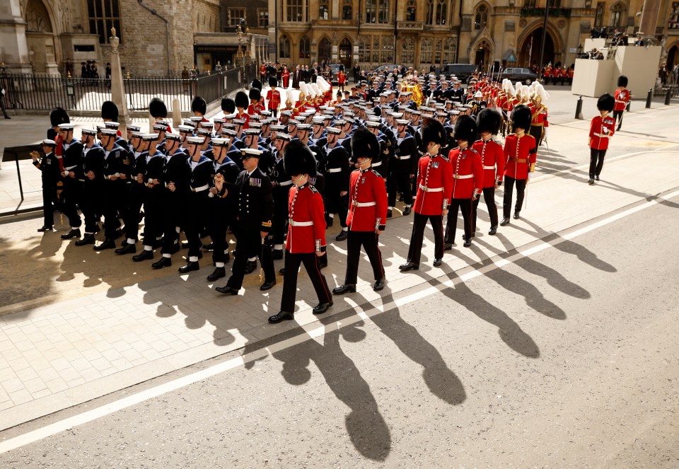 The coffin of the Queen makes it way on the funeral procession from Westminster Abbey