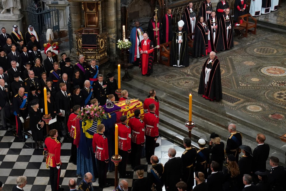 The coffin is placed near the altar at Westminster Abbey