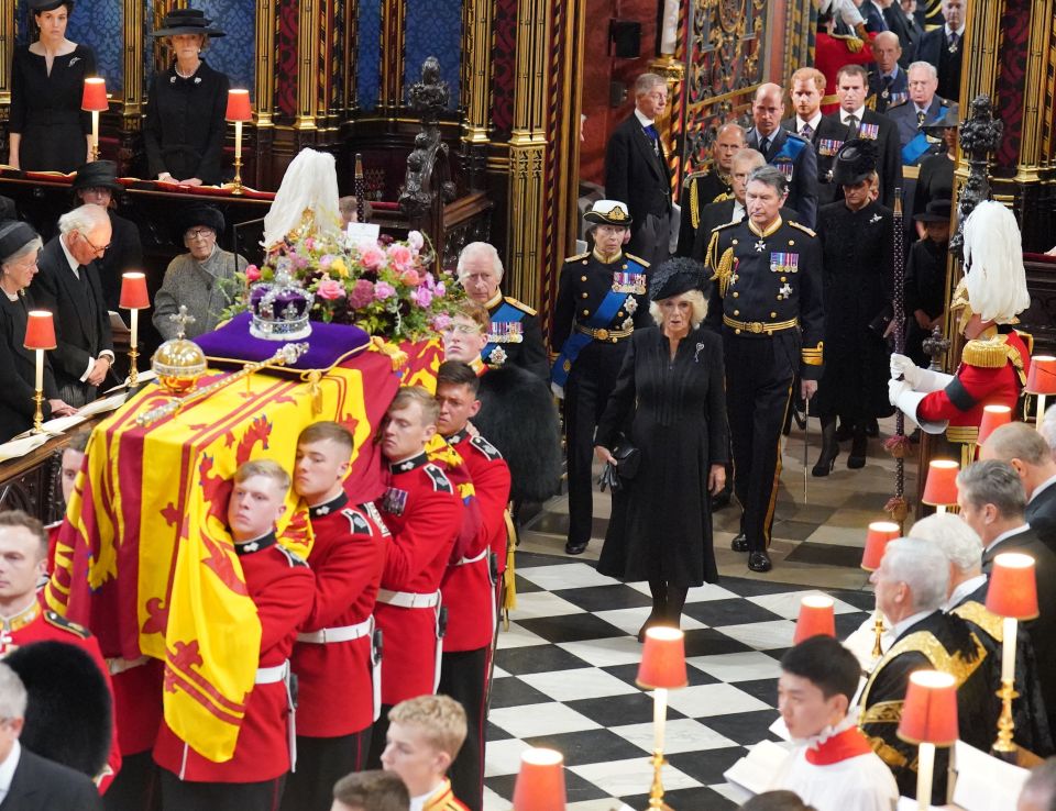 Emotional members of the royal family follow Her Majesty's coffin at Westminster Abbey