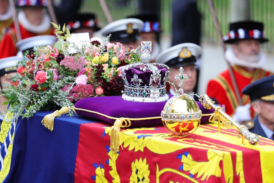 The coffin, draped in the Royal Standard, with the Imperial State Crown resting on top