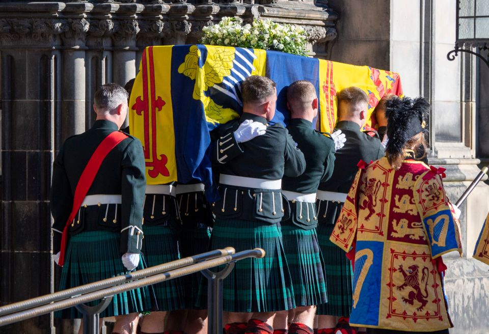 She was taken to a hearse after departing the church