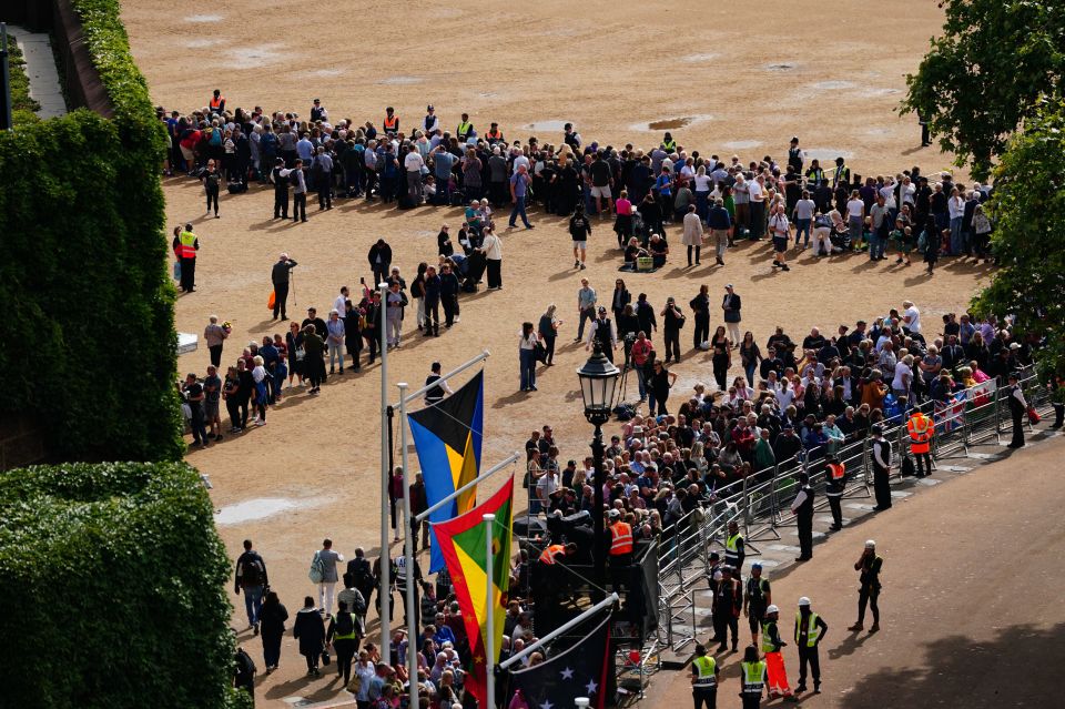 Crowds have gathered on Horse Guards Parade ahead of the ceremonial procession