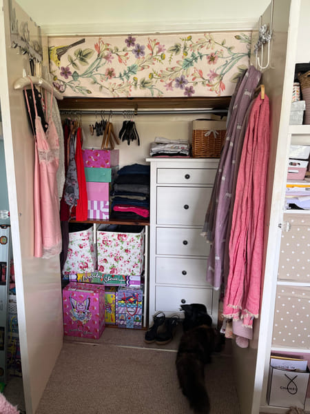 Her wardrobe was cluttered and disorganised