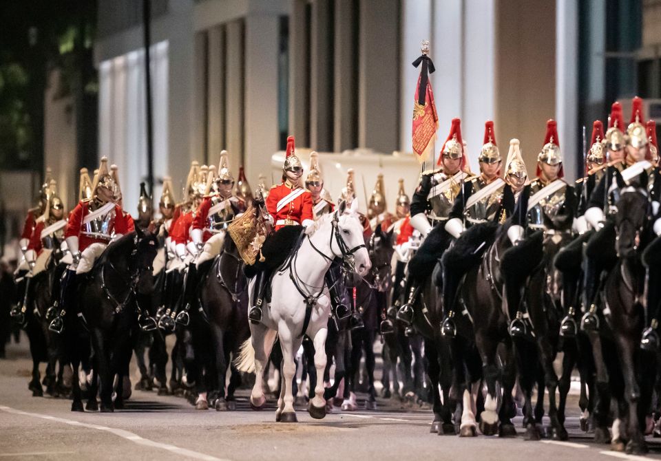 Household Cavalry troopers take part in an early morning rehearsal yesterday for the funeral of The Queen in London