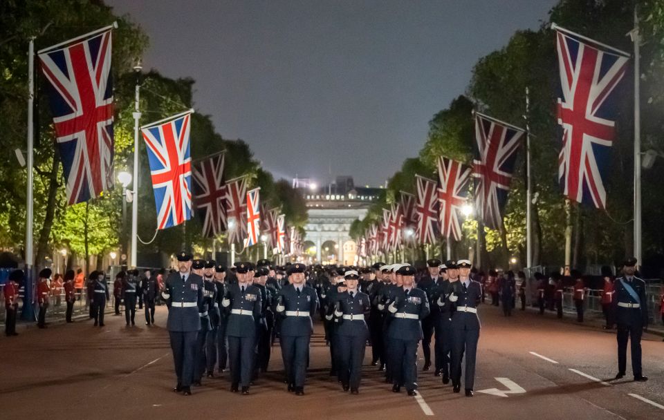 Service personnel rehearse in The Mall ahead of Monday's funeral