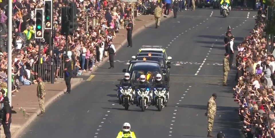 Crowds cheered as the Royal cars drove past