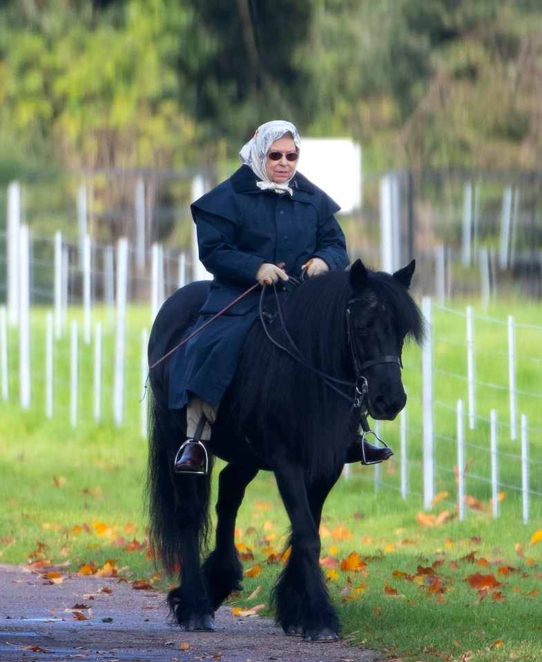 Queen Elizabeth II rides her pony Emma at Windsor Castle with Head Groom Terry Pendry