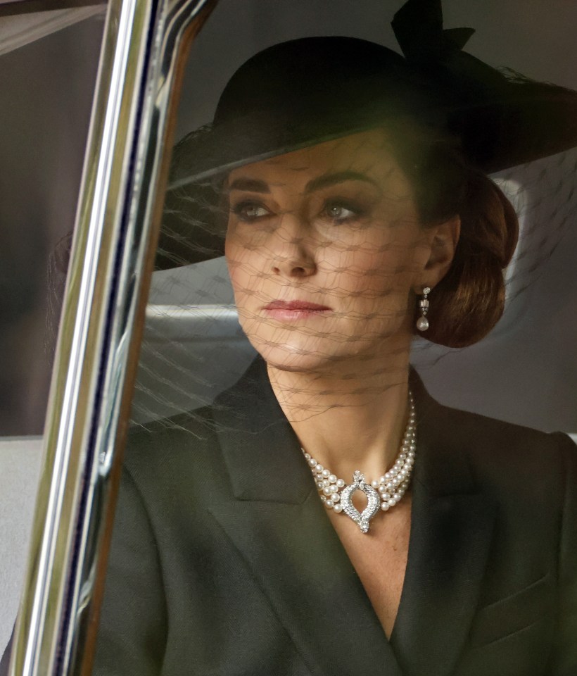 The Princess of Wales, wearing the Queen's necklaces, on her way to the service