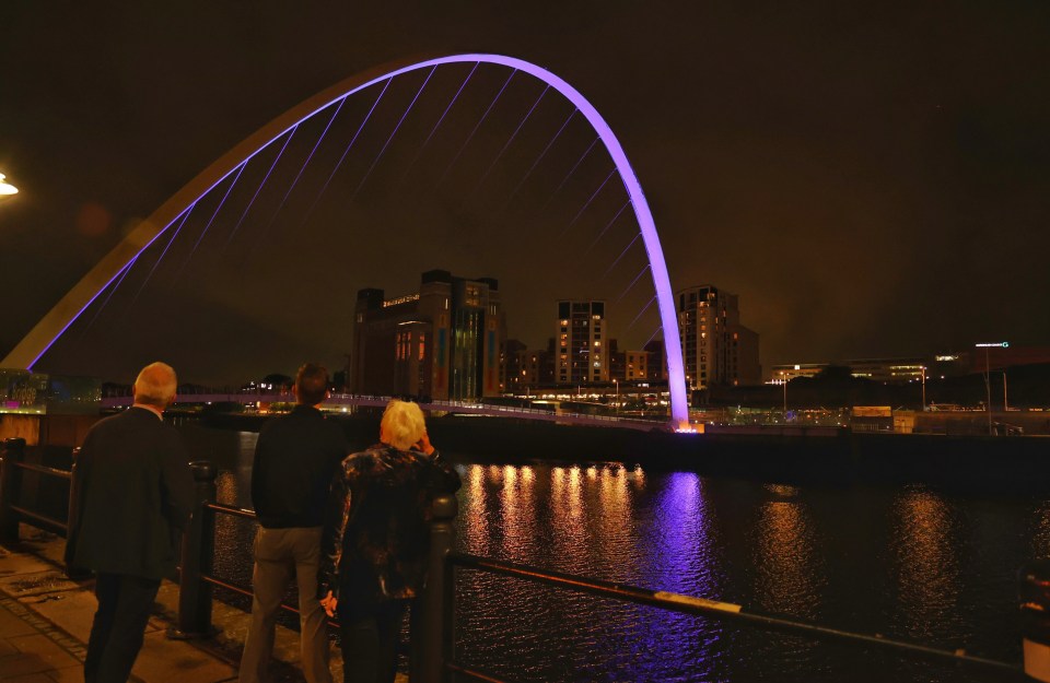 The Millennium Bridge over the River Tyne lit purple in honour of The Queen