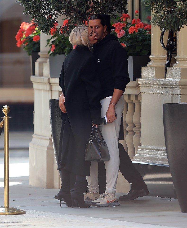 The couple were sighted getting close outside a hotel in Mayfair, London