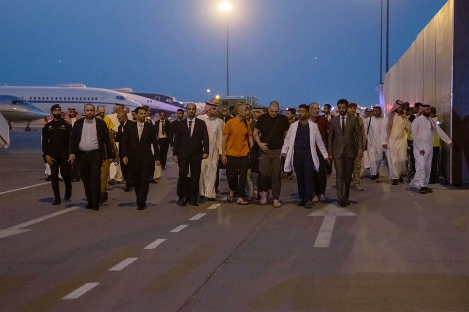 The freed prisoners after arriving in Saudi Arabia