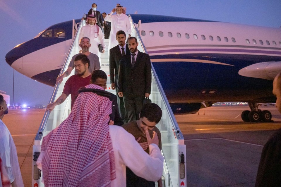 The freed prisoners arriving in Saudi Arabia