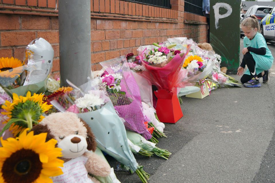 Flowers left at the scene in Kingsheath Avenue, Knotty Ash