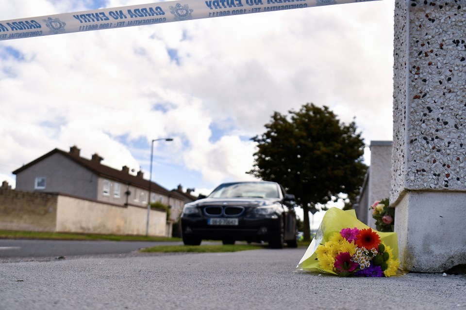 Flowers placed near the scene