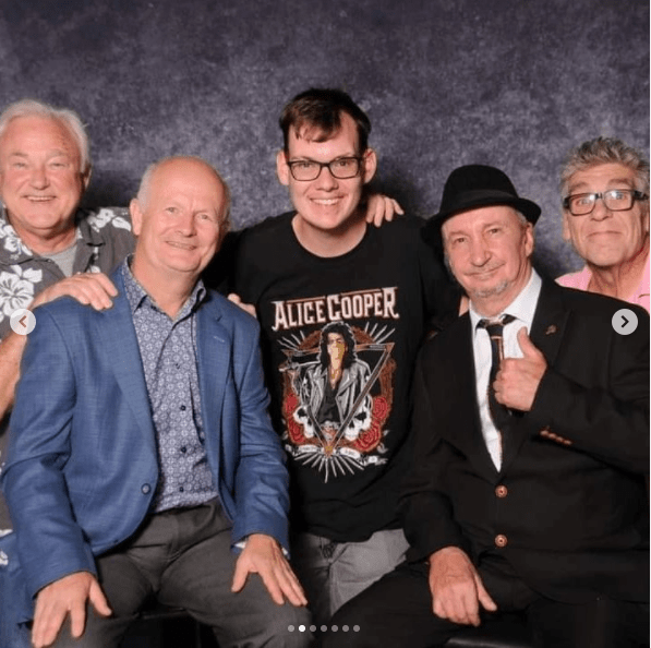 Only Fools and Horses stars (from left) Philip Pope, Michael Fenton Stevens, Patrick Murray and Daniel Peacock posed with a fan (centre)