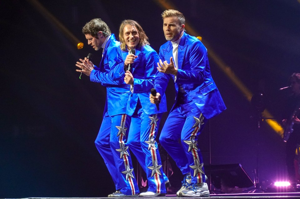 Trio Gary, Howard Donald and Mark Owen perform at the opening night of their UK tour in Sheffield in 2019