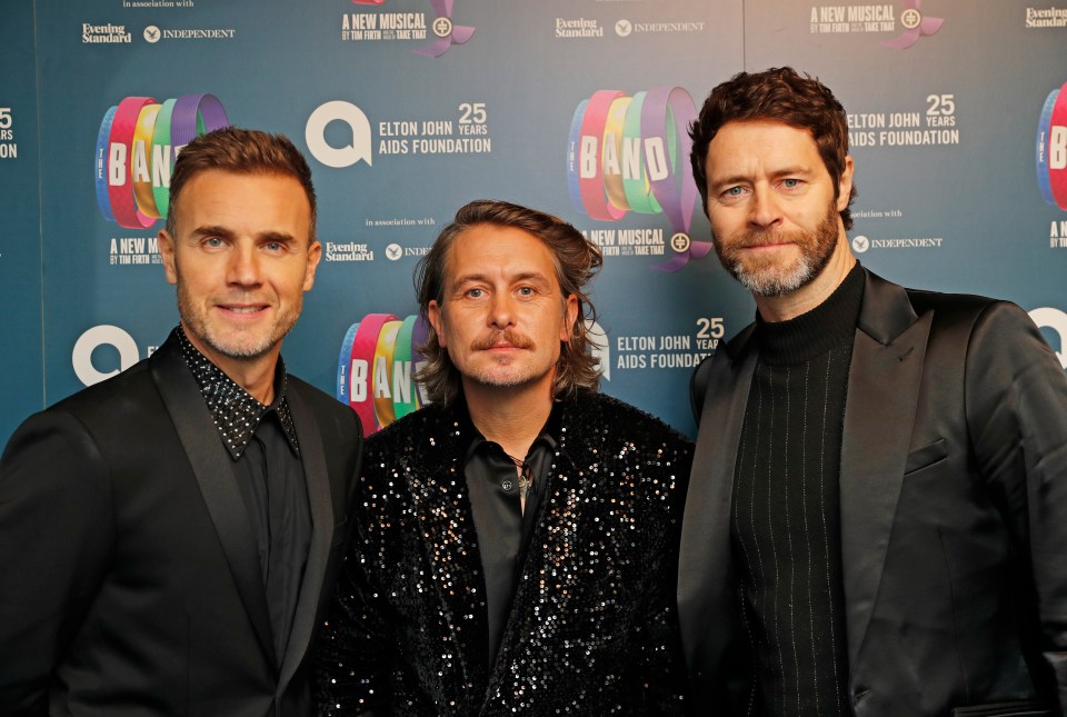 Take That's Gary Barlow, left, Mark Owen, centre, and Howard Donald, right