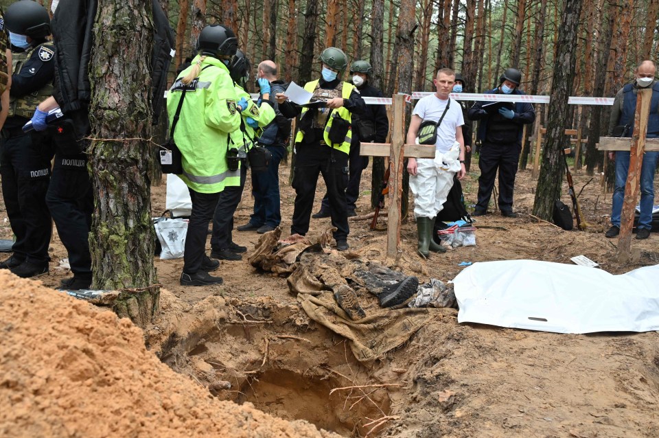 A body of one of those killed after being dug up