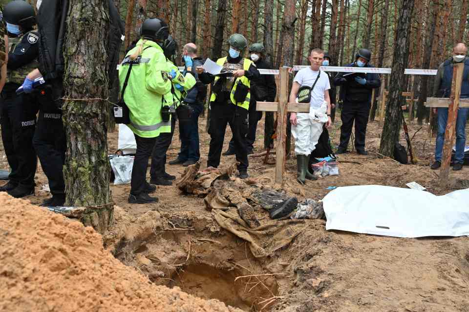 A body of one of those killed after being dug up