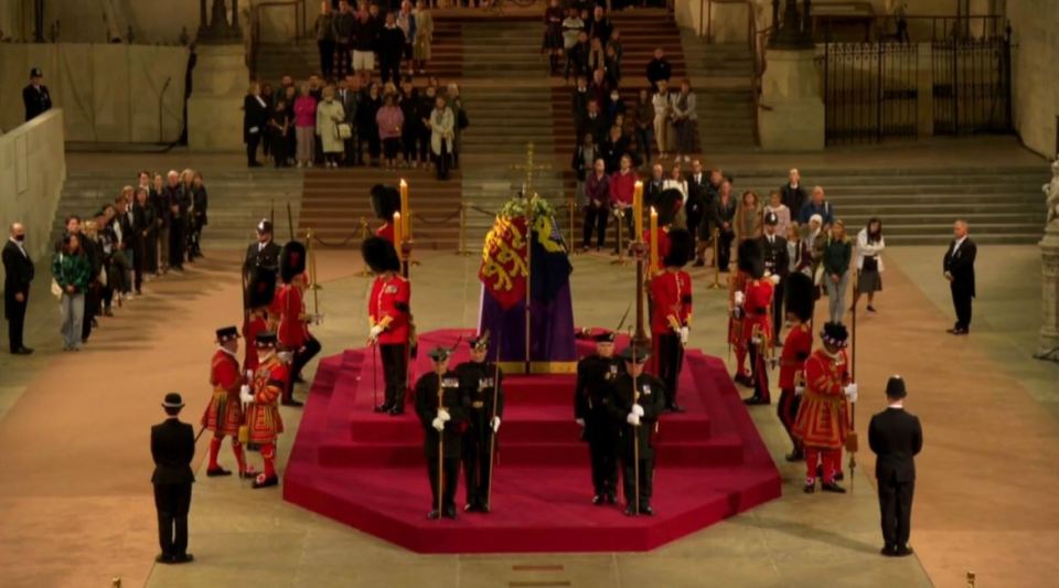 The guard was standing beside the Queen's coffin as mourners filed past