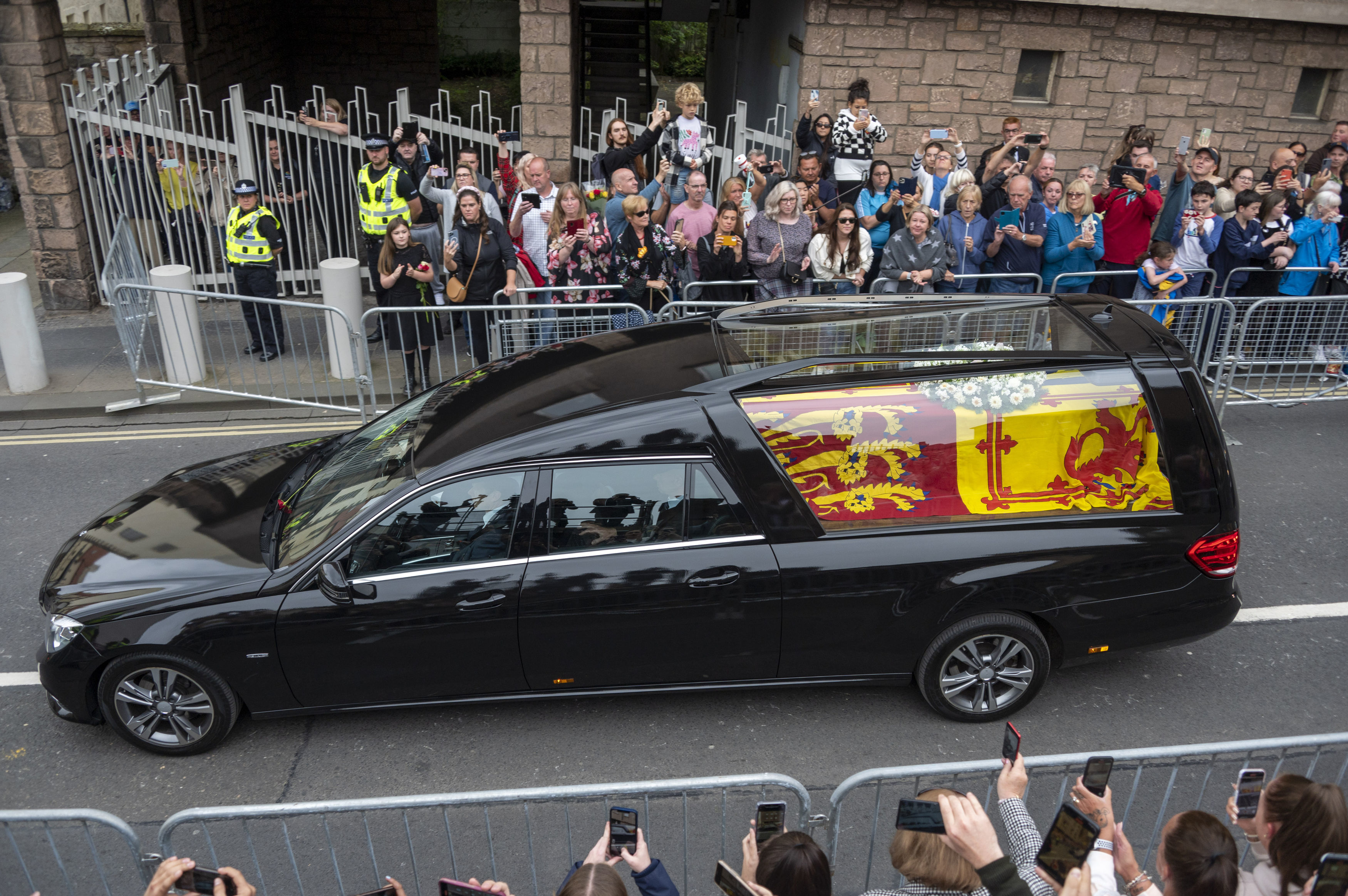 The plans will be discussed in the coming days - pictured the Queen's coffin passes well wishers on the Royal Mile in Edinburgh