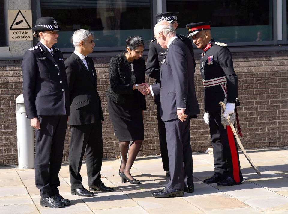 Home Secretary Suella Braverman is greeted by King Charles III upon his arrival