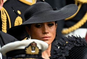 Meghan Markle was crying as the Queen's coffin was put in the hearse