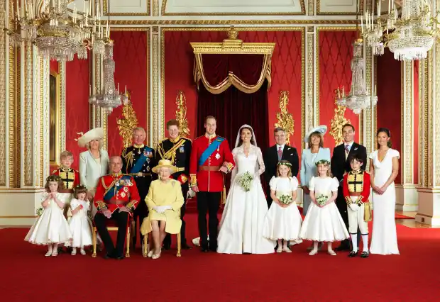 She poses with the Royal Family at William and Kate's wedding in 2011