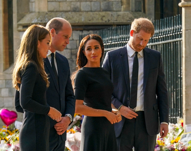 The brothers joined their wives to look at tributes for the Queen